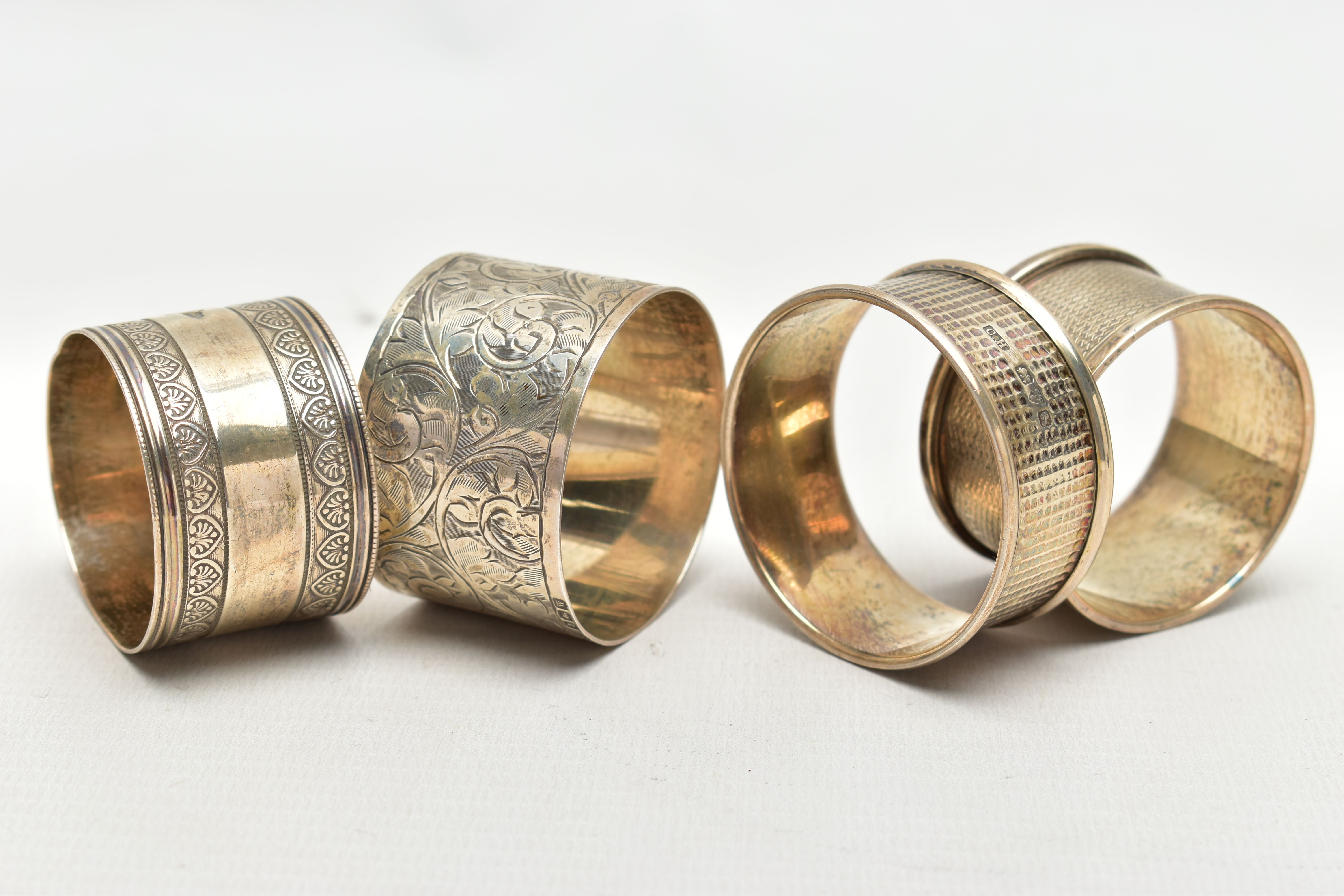 A SELECTION OF FOUR SILVER NAPKIN RINGS, to include an early 20th century Charles Horner napkin ring - Image 3 of 3