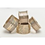 A SELECTION OF FOUR SILVER NAPKIN RINGS, to include an early 20th century Charles Horner napkin ring