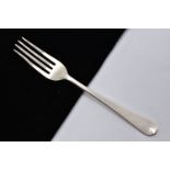 A SINGLE WHITE METAL FORK, Hanoverian polished pattern fork, engraved crest to the reverse of the