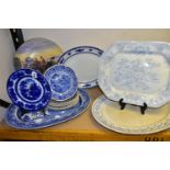 A GROUP OF NINETEENTH AND TWENTIETH CENTURY PLATES, to include four large blue and white meat