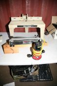 A STANLEY TOPLINE 1056 1/4in ROUTER Mk2 (untested), a Trend Dovetail Jig and a Black and Decker