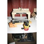 A STANLEY TOPLINE 1056 1/4in ROUTER Mk2 (untested), a Trend Dovetail Jig and a Black and Decker