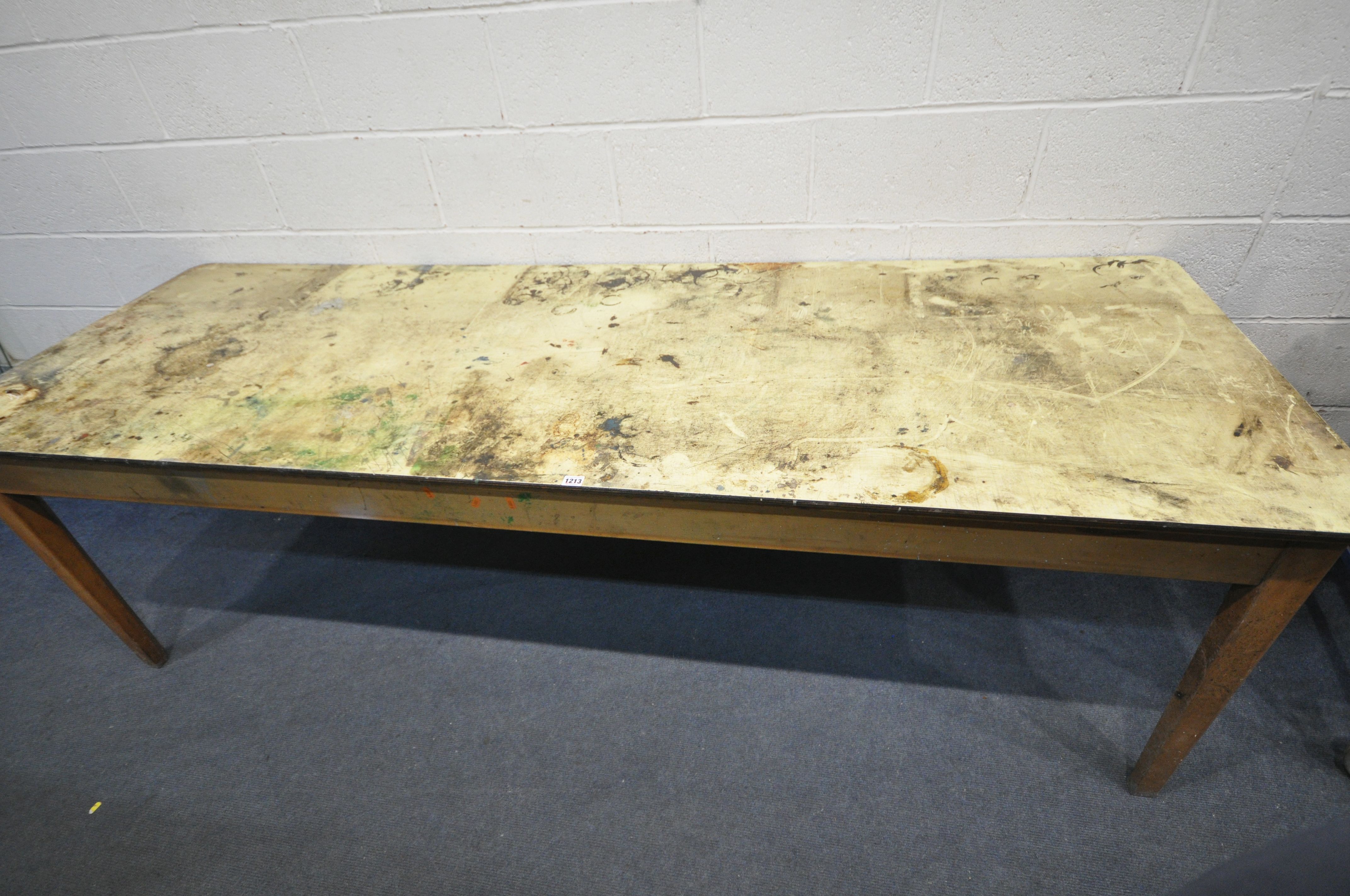 A MID CENTURY BEECH HABERDASHERY TABLE, length 244cm x depth 84cm x height 77cm (condition - lots of