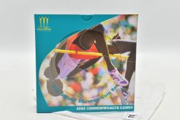 A ROYAL MINT 2002 MANCHESTER COMMONWEALTH GAMES SOUVENIR COIN SET, to include four 2002 Two Pound