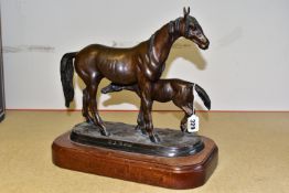 A BRONZE SCULPTURE OF A MARE AND FOAL, on a wooden stand marked on base P.J. Méné , height 33cm (1)
