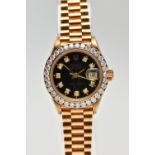 AN 18CT YELLOW GOLD AUTOMATIC ROLEX OYSTER PERPETUAL DATEJUST WITH DIAMOND DOT DIAL, fitted with