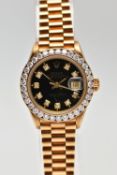 AN 18CT YELLOW GOLD AUTOMATIC ROLEX OYSTER PERPETUAL DATEJUST WITH DIAMOND DOT DIAL, fitted with