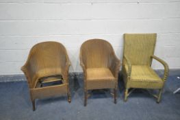 THREE LLOYD LOOM BASKET WEAVE ELBOW CHAIRS two with x stretchered bases the third missing its seat