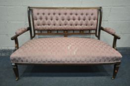 A 19TH CENTURY ROSEWOOD AND MARQUETRY INLAID SOFA, with buttoned pink upholstery, and open armrests,