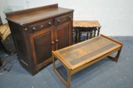 A MID CENTURY TEAK COFFEE TABLE with an etched and detailed copper plate to top width 117cm x