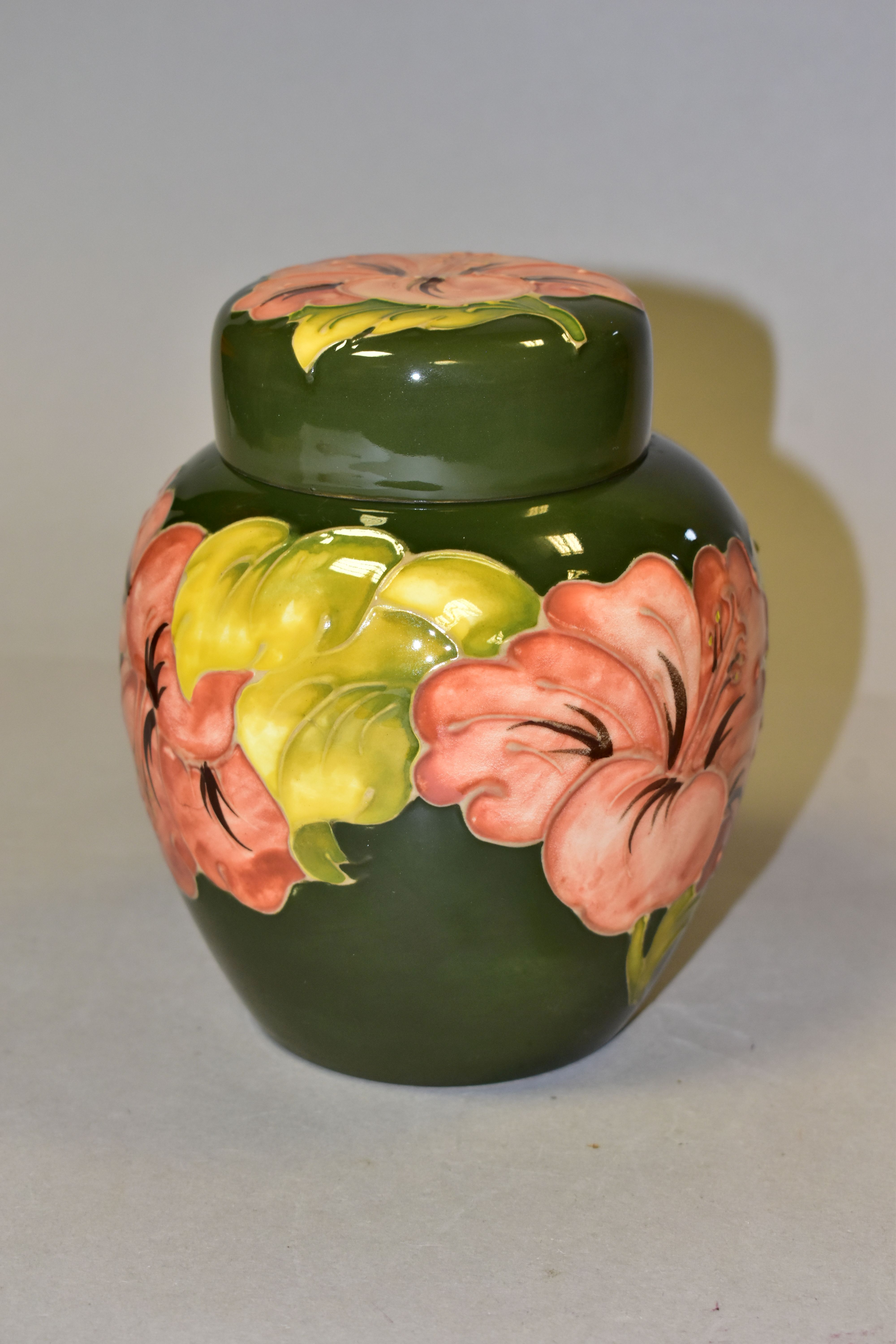 A MOORCROFT POTTERY GINGER JAR AND COVER, in the Coral Hibiscus pattern on a green ground, bears - Image 2 of 5