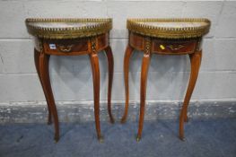 A NEAR PAIR OF LOUIS XV STYLE DEMI LUNE TABLES, with brass gallery, marble top, brass mounts and a