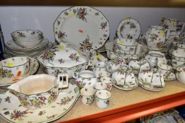 A LARGE QUANTITY OF ROYAL DOULTON 'OLD LEEDS SPRAYS' PATTERN DINNER WARE, comprising a bread and