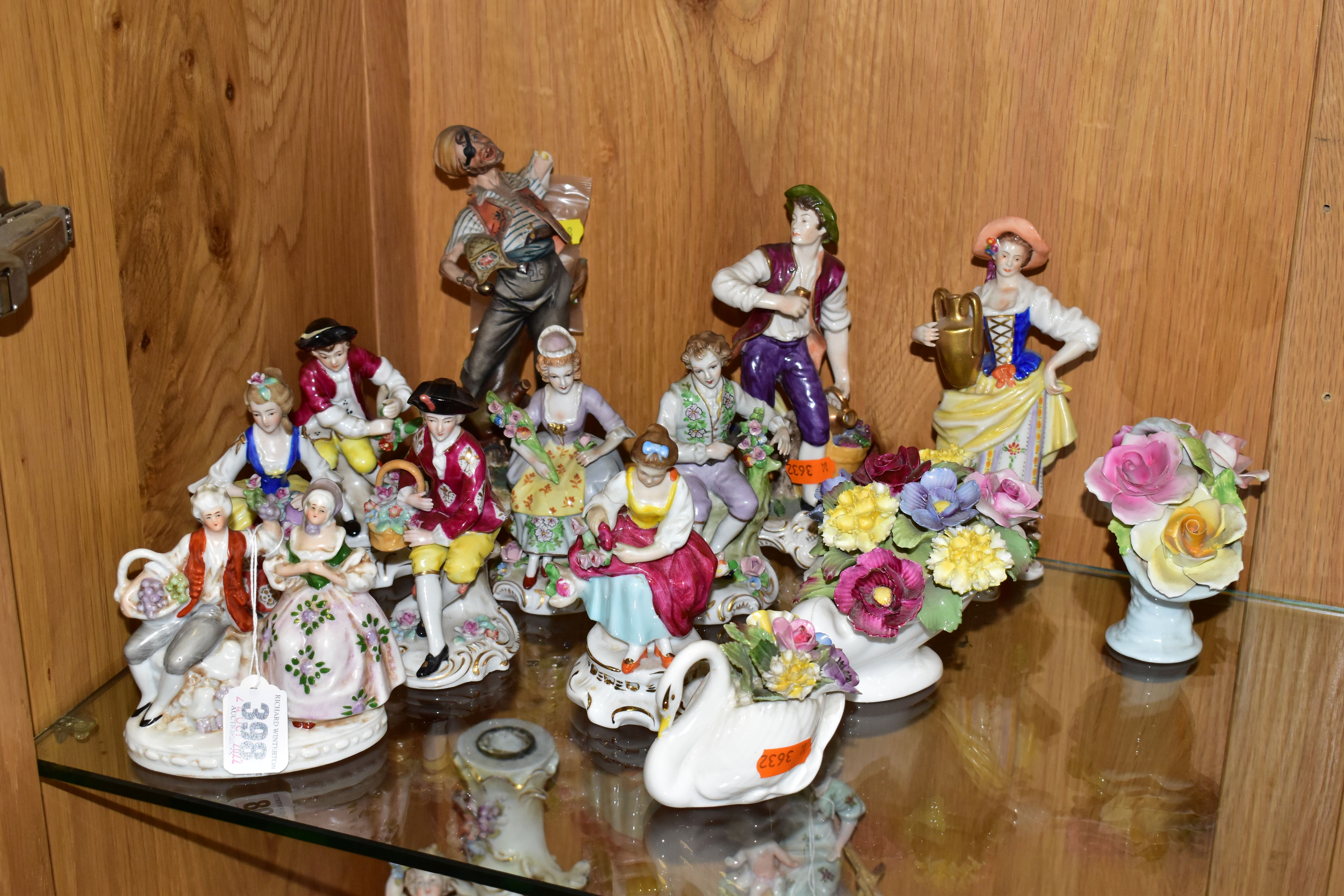 A GROUP OF CONTINENTAL PORCELAIN FIGURINES AND OTHER CERAMIC ORNAMENTS, to include a pair of