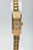 A 9CT GOLD WRISTWATCH, hand wound movement, rectangular dial signed 'Trebex' Incabloc, baton