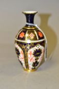 A ROYAL CROWN DERBY IMARI SMALL BALUSTER VASE, decorated in the 1128 pattern, date cypher for