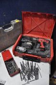 A MILWAUKEE HEAVY DUTY DRILL model No unknown in case with two battery's - no charger (UNTESTED)
