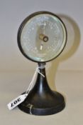 A CP GOERZ BERLIN ANEROID DESK BAROMETER, having a glass face with white dial, with painted black