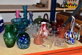 A COLLECTION OF COLOURED GLASS, comprising three Murano style bud vases, two Mdina studio art bud