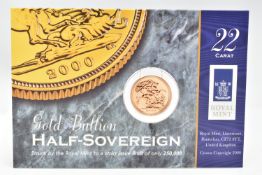 A ROYAL MINT CARDED 2000 GOLD BULLION HALF SOVEREIGN COIN, 19.3mm, 3.99 grams, issue limit 250,000
