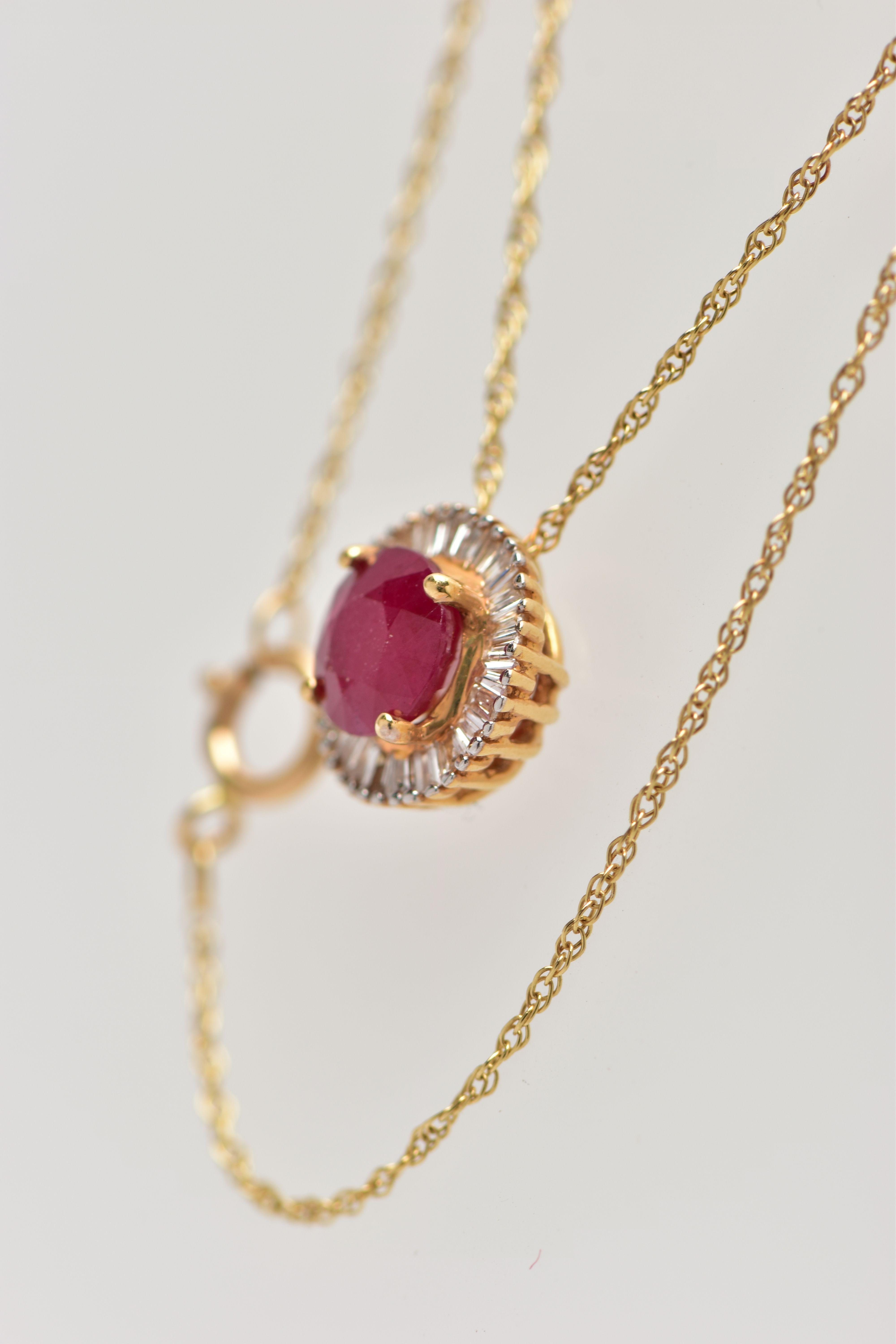 AN 18CT YELLOW GOLD GLASS FILLED RUBY AND DIAMOND CLUSTER PENDANT, WITH YELLOW METAL CHAIN, the - Image 3 of 4