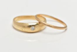 TWO 9CT GOLD RINGS, the first a single stone diamond ring, set in a yellow gold domed band mount,