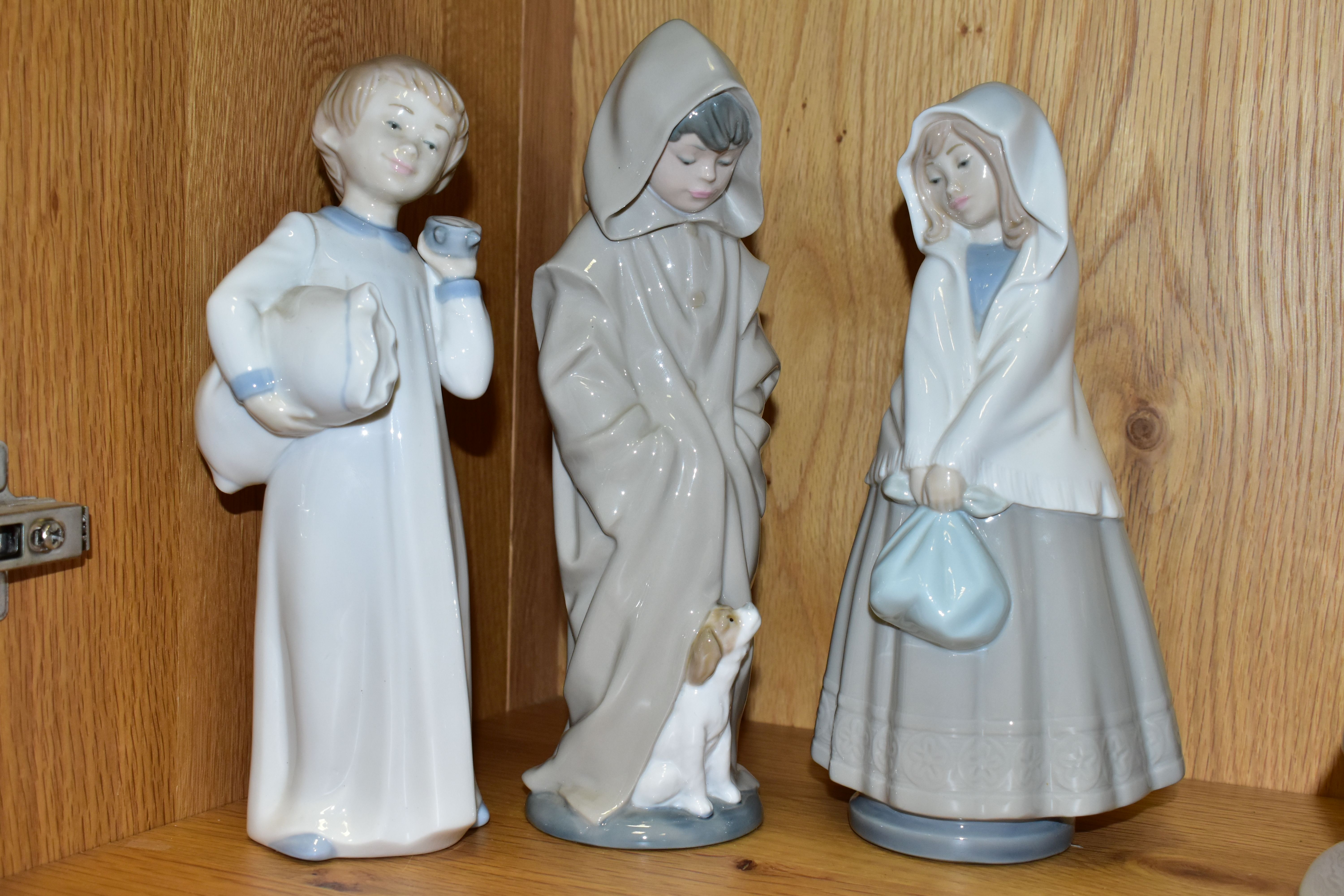 FOUR NAO FIGURES OF CHILDREN, comprising a boy with pillow and alarm clock (glued repair to the - Image 3 of 4