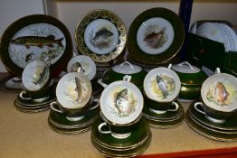 AN 'EDWARDIAN' DINNER SERVICE DECORATED WITH COLD WATER FISH, with a green and gold border