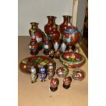 A COLLECTION OF MODERN CLOISONNÉ comprising four vases on wooden stands, a ginger jar, dish, bowl