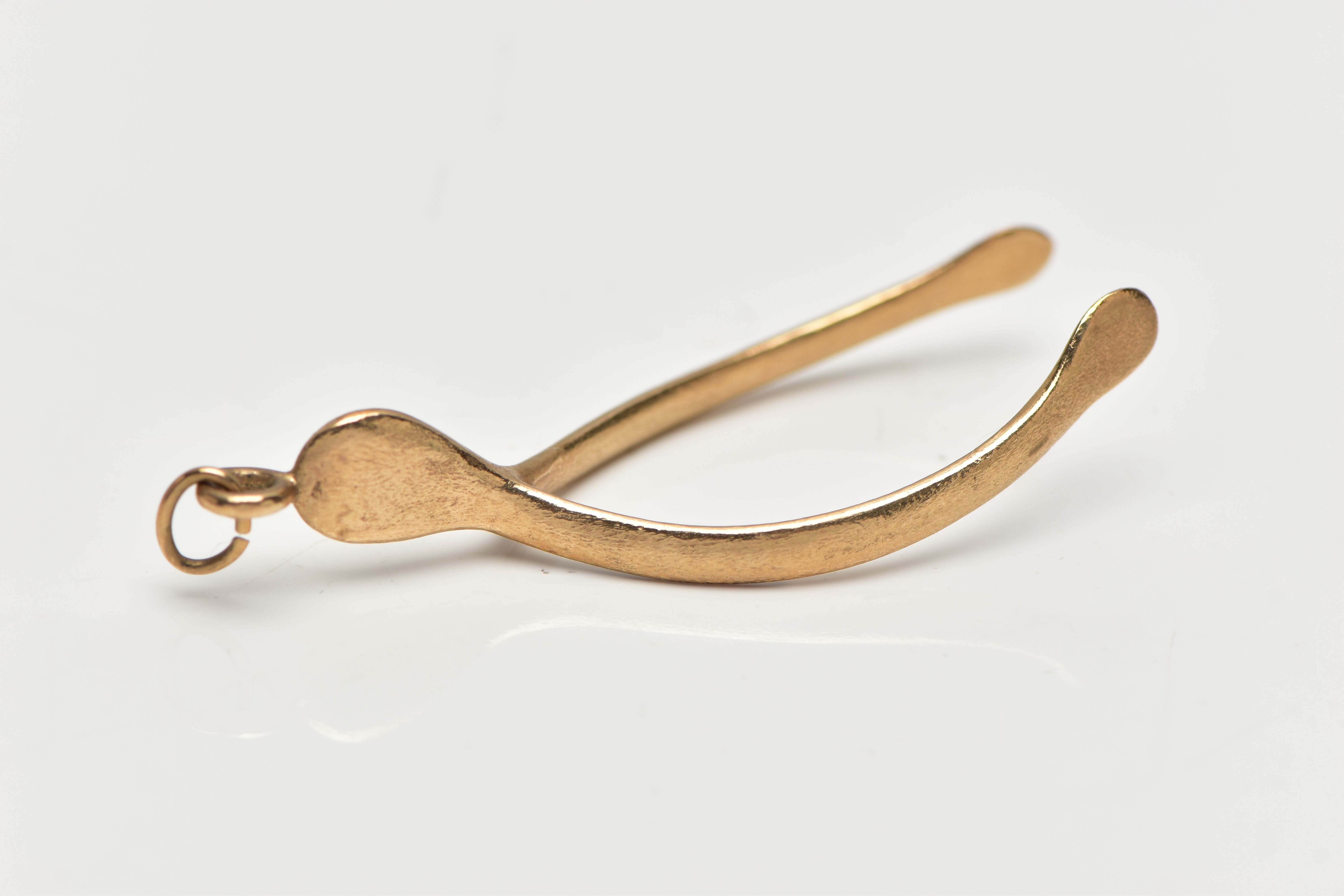 A 1970s 9CT YELLOW GOLD WISH BONE PENDANT, the pendant of plain polished design, approximate - Image 2 of 3