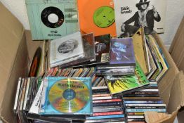 A BOX CONTAINING ONE HUNDRED AND SEVENTY 7in SINGLES and seventy CDs from artists such as Sex