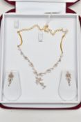 A DIAMOND NECKLACE AND EARRING SET, WITH ONLINE IGI NATURAL DIAMOND GRADING REPORT, the necklace