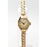 A 9CT GOLD WRISTWATCH, hand wond movement, round dial signed 'Visible', Arabic numerals, polished