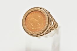 A 9CT GOLD RING MOUNTED WITH A 1/10 OZ KRUGERRAND, the 1/10oz Krugerrand coin dated 1980, mounted