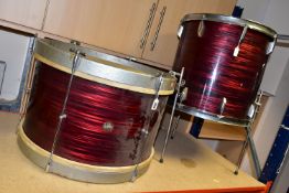 TWO BEVERLEY DRUMS, 1960/1970's in red silk pearl, bass drum with matching tomtom on stand (2) (