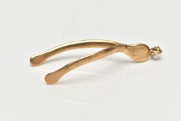 A 1970s 9CT YELLOW GOLD WISH BONE PENDANT, the pendant of plain polished design, approximate