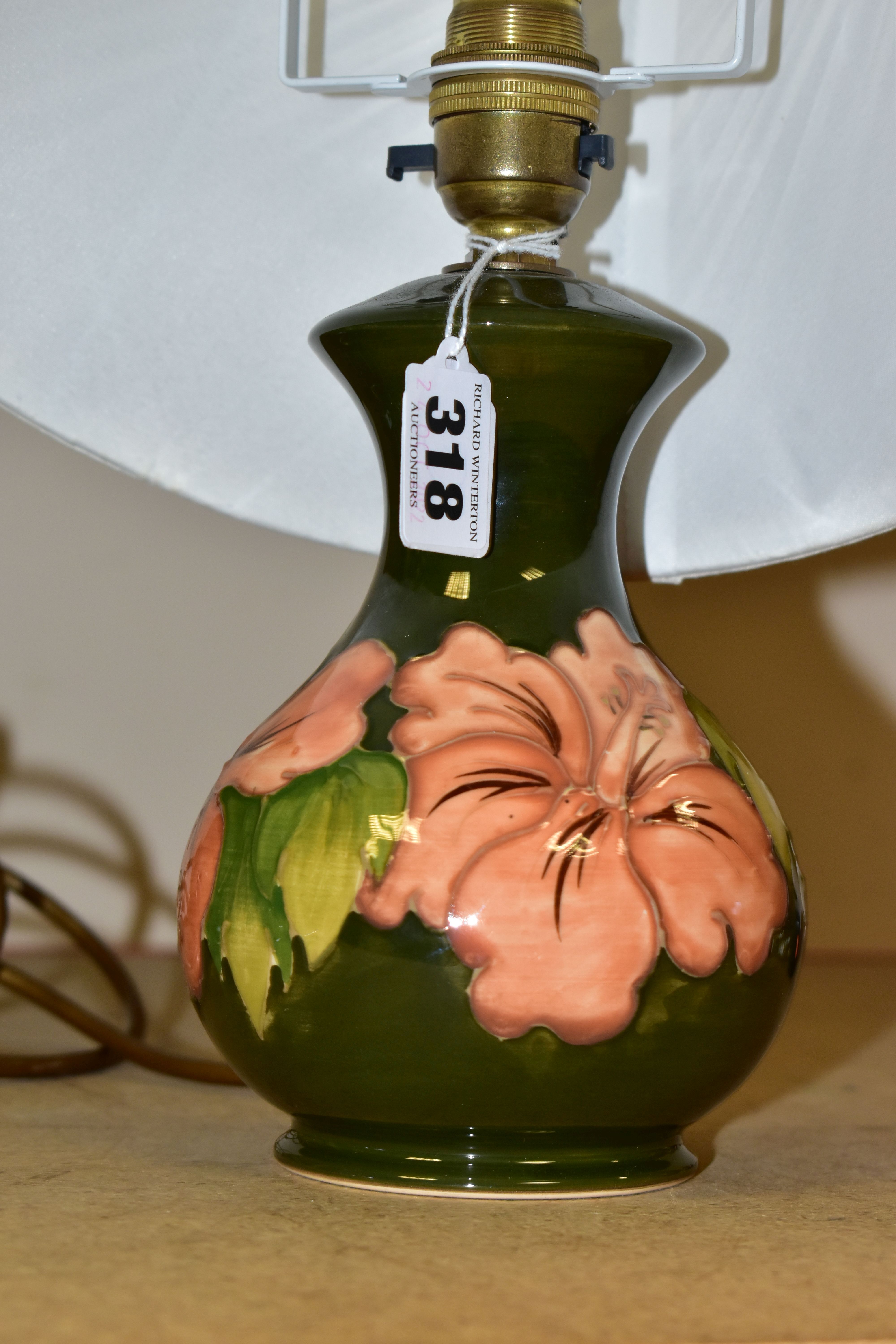 A MOORCROFT TABLE LAMP, decorated in the Coral Hibiscus pattern on a green ground with a cream - Image 2 of 4