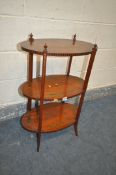 A 19TH CENTURY SATINWOOD OVAL THREE TIER ETAGERE, with painted marquetry detail, width 51cm x