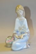 A LLADRO FLOWERS SONG FIGURINE, model no 7607, sculptor Juan Huerta, printed 'Lladro Museum