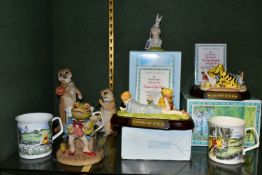 A GROUP OF ROYAL DOULTON WINNIE THE POOH CERAMICS AND OTHER ORNAMENTS, comprising a boxed limited