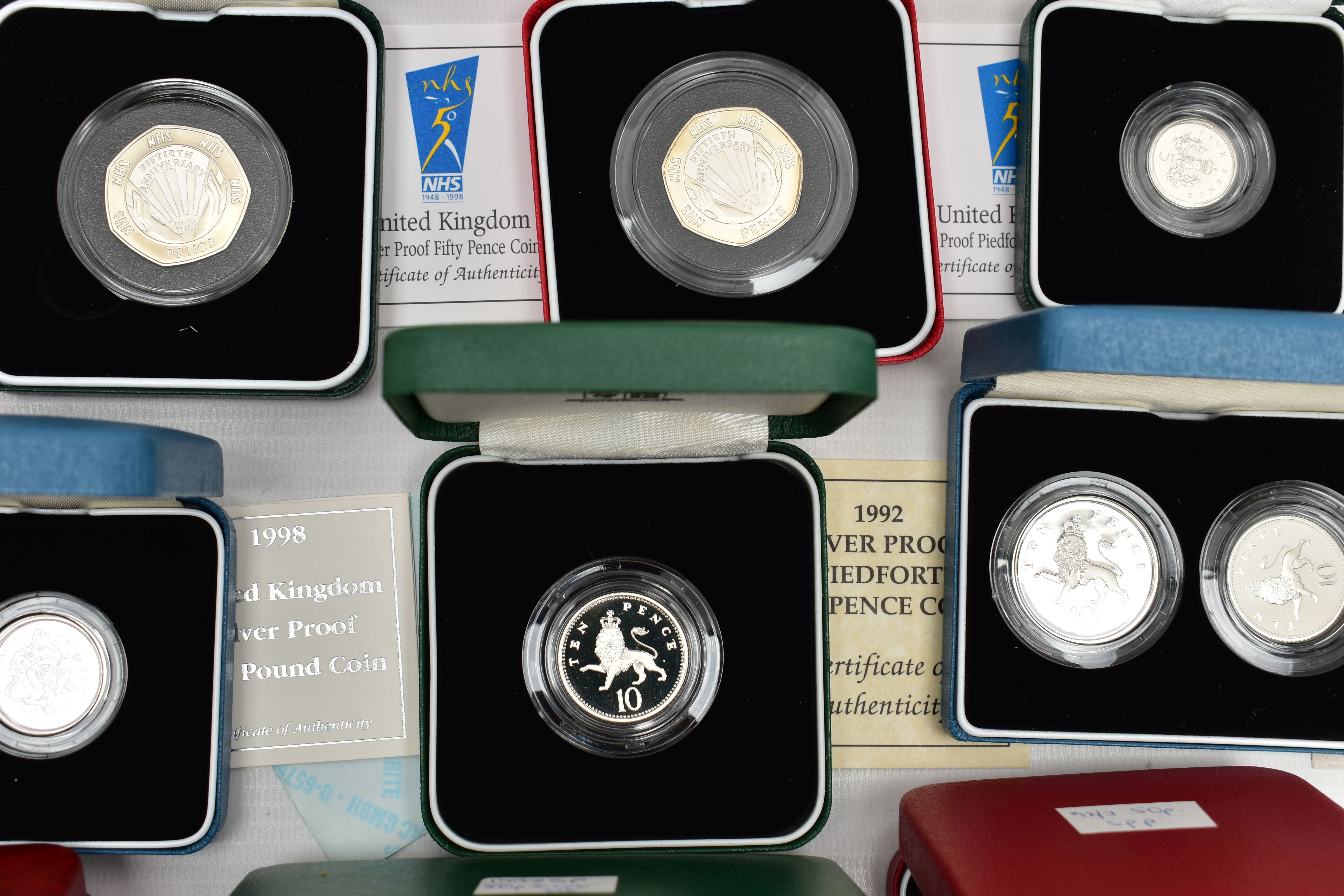 A GROUP OF ROYAL MINT SILVER PROOF UK BOXED COINS, to include a 1992-93 Silver proof Piedfort - Image 3 of 6