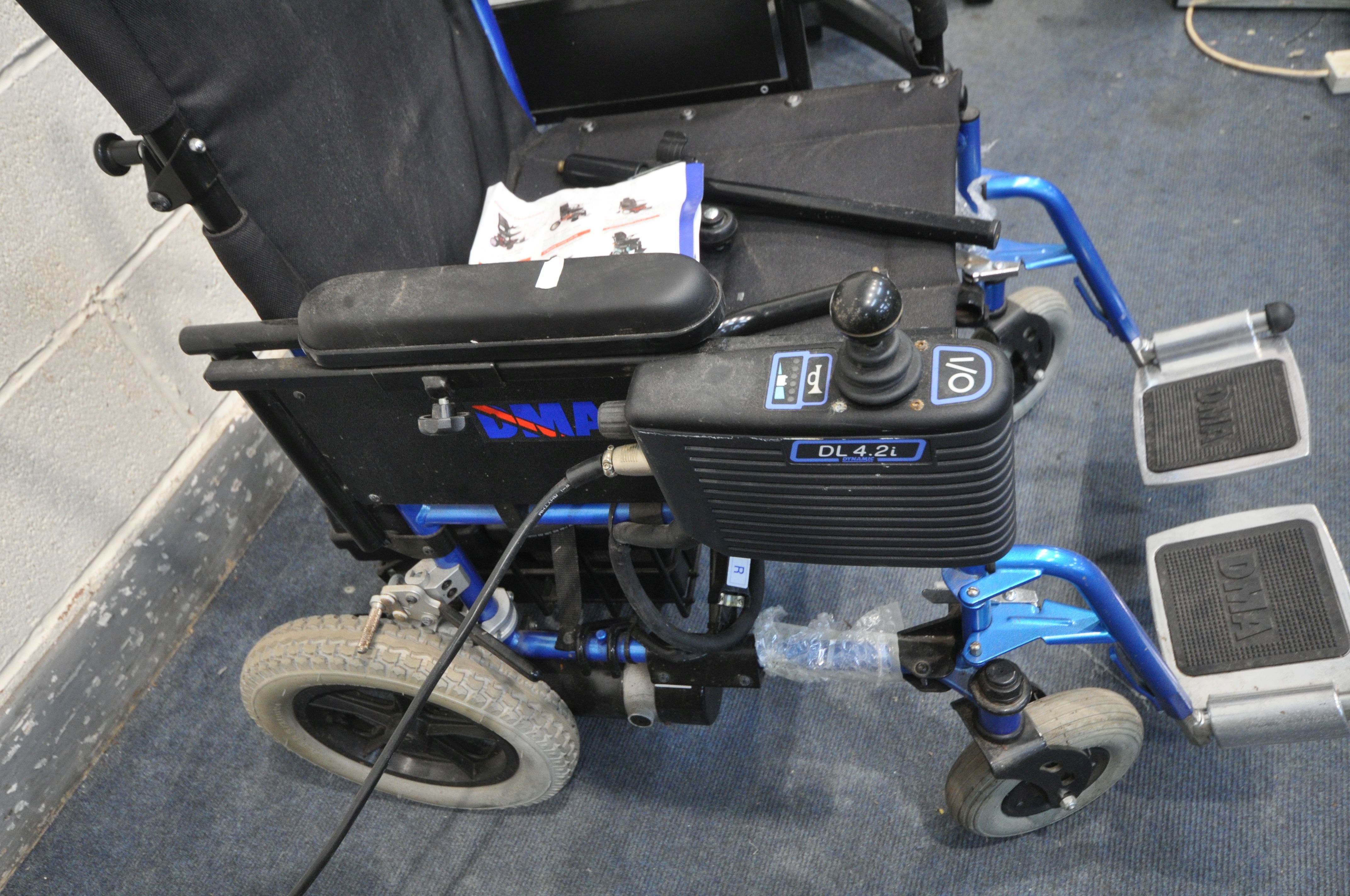 A DMA DL4.2i ELECTRIC WHEELCHAIR with power supply, two footrest and two flip bars ( PAT pass but - Image 2 of 3