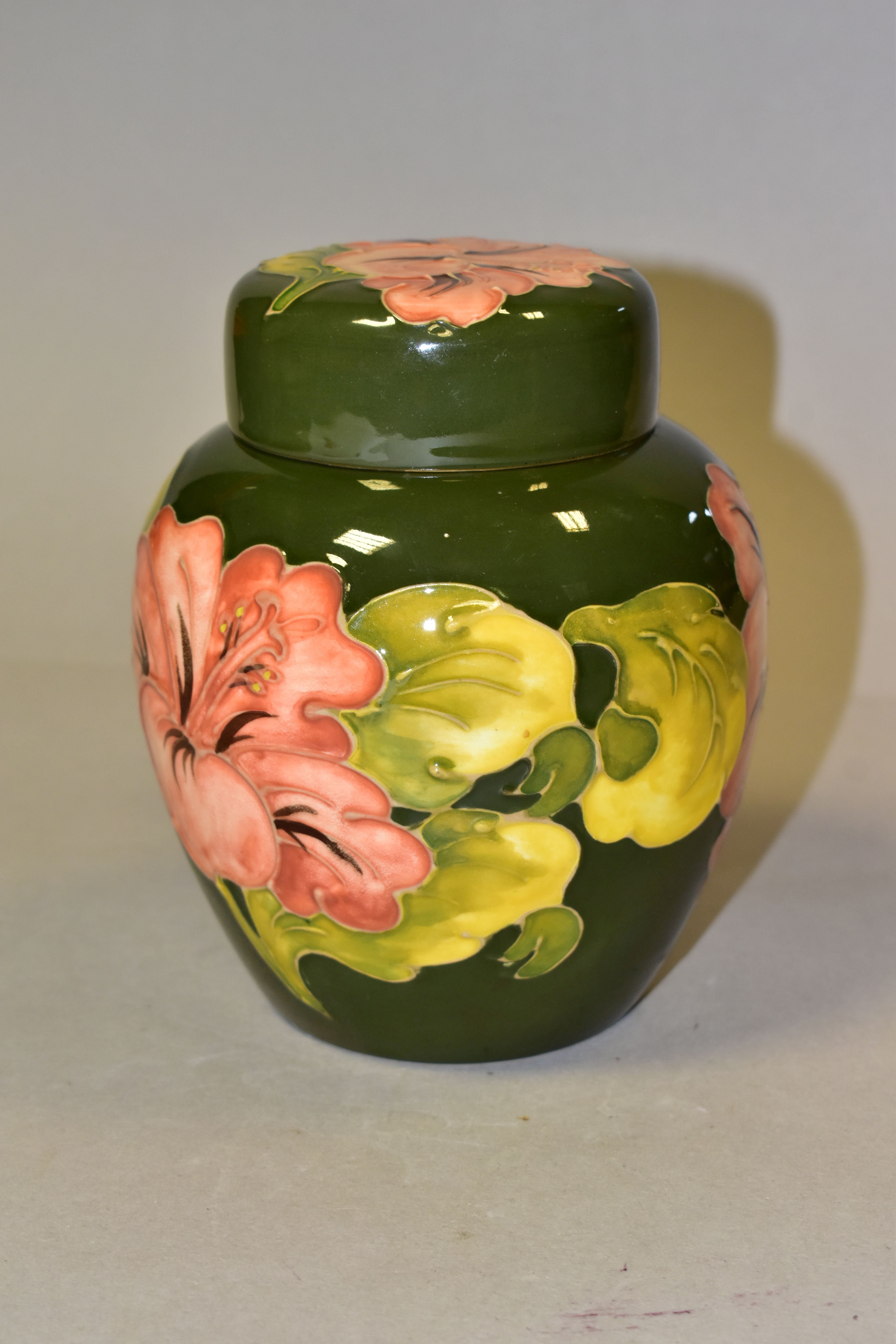 A MOORCROFT POTTERY GINGER JAR AND COVER, in the Coral Hibiscus pattern on a green ground, bears - Image 3 of 5