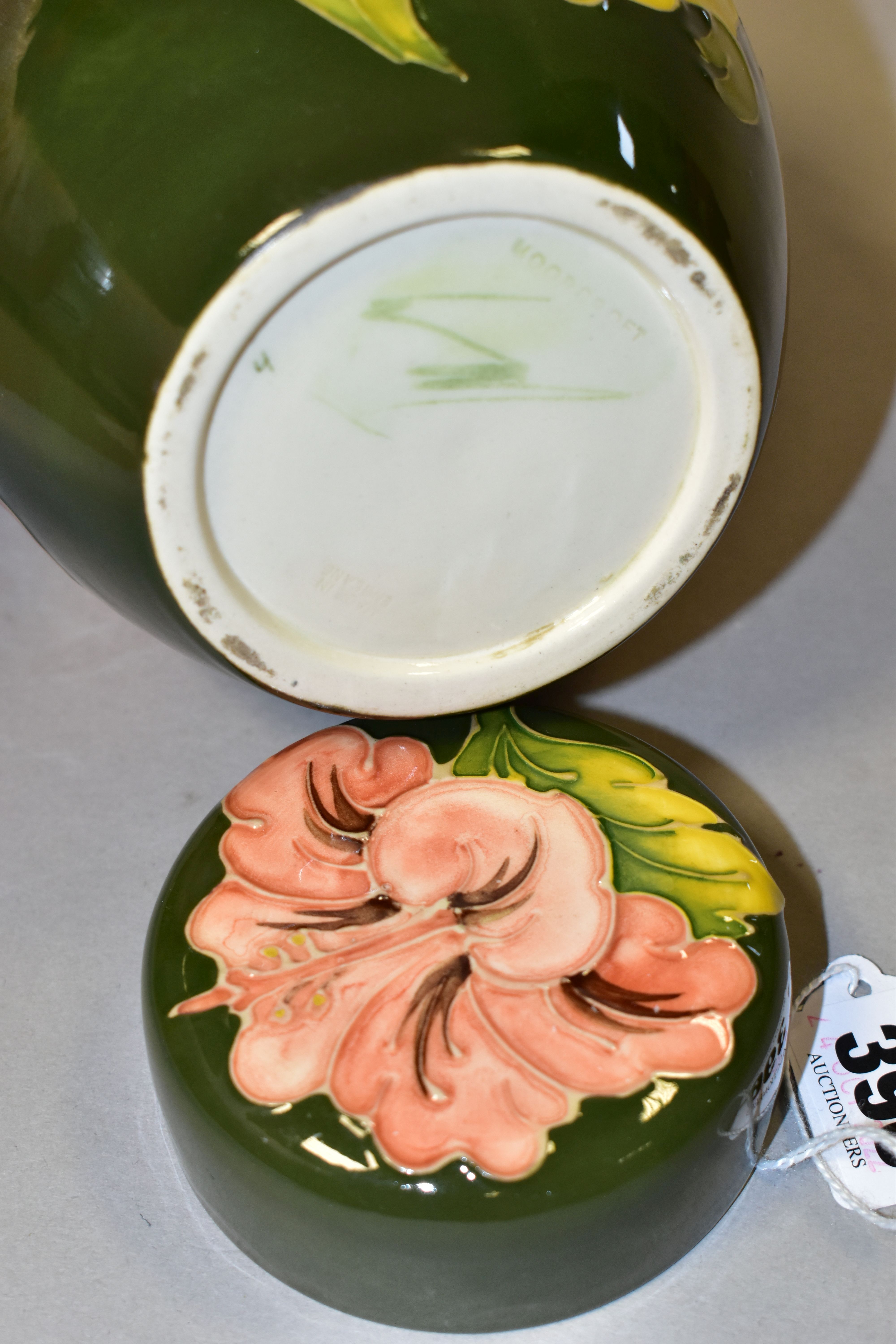 A MOORCROFT POTTERY GINGER JAR AND COVER, in the Coral Hibiscus pattern on a green ground, bears - Image 5 of 5