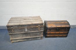 TWO VINTAGE TRAVEL TRUNKS with oak and steel banding to both, one with a domed top width 75cm x