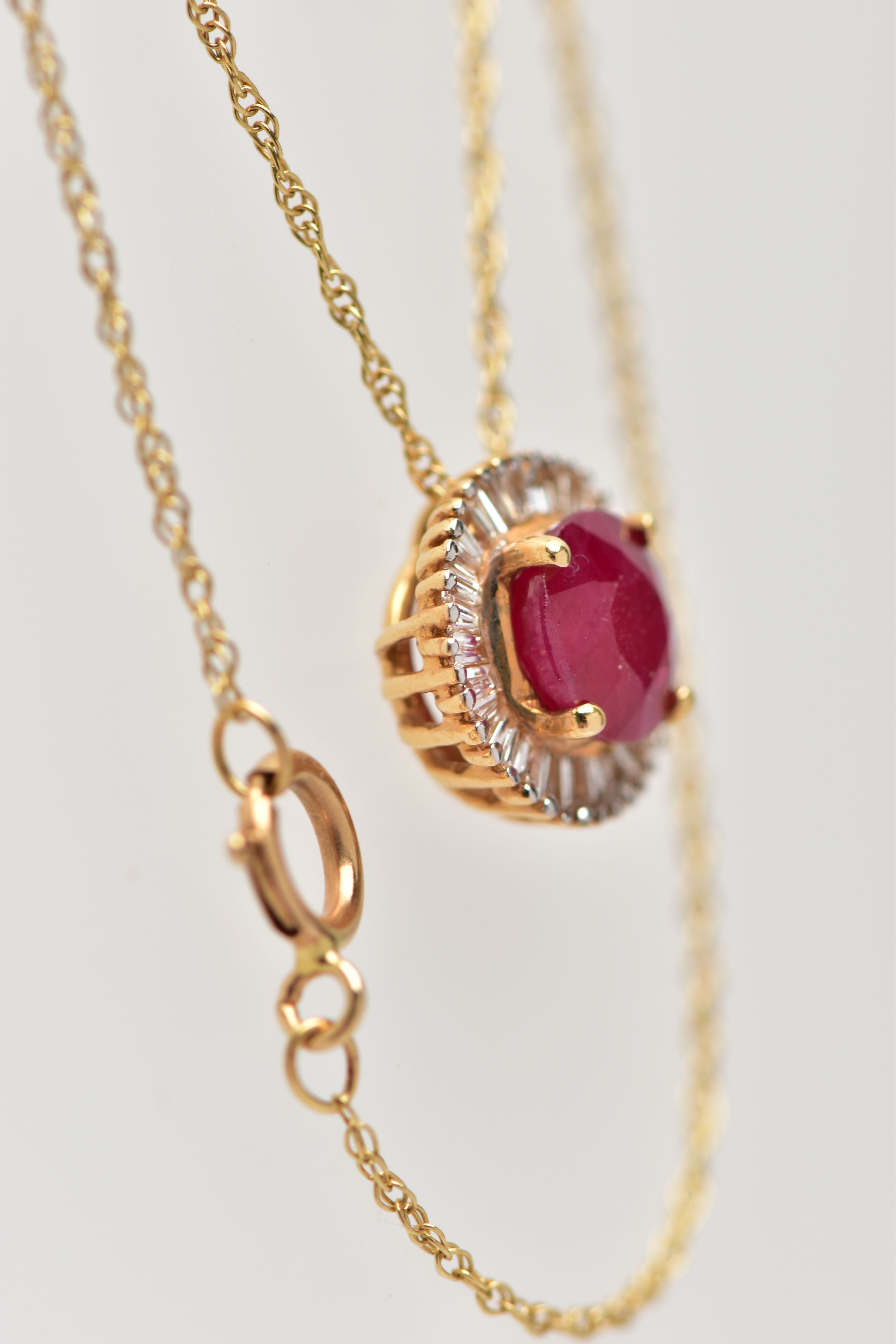 AN 18CT YELLOW GOLD GLASS FILLED RUBY AND DIAMOND CLUSTER PENDANT, WITH YELLOW METAL CHAIN, the - Image 2 of 4