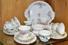 A ROYAL ALBERT 'MOSS ROSE' PATTERN TEA SET TOGETHER WITH A ROYAL ALBERT 'CAPE BRETON ISLAND' PATTERN