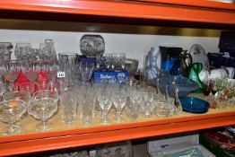 A LARGE QUANTITY OF CUT CRYSTAL AND COLOURED GLASSWARE, a boxed pair of brandy glasses, three