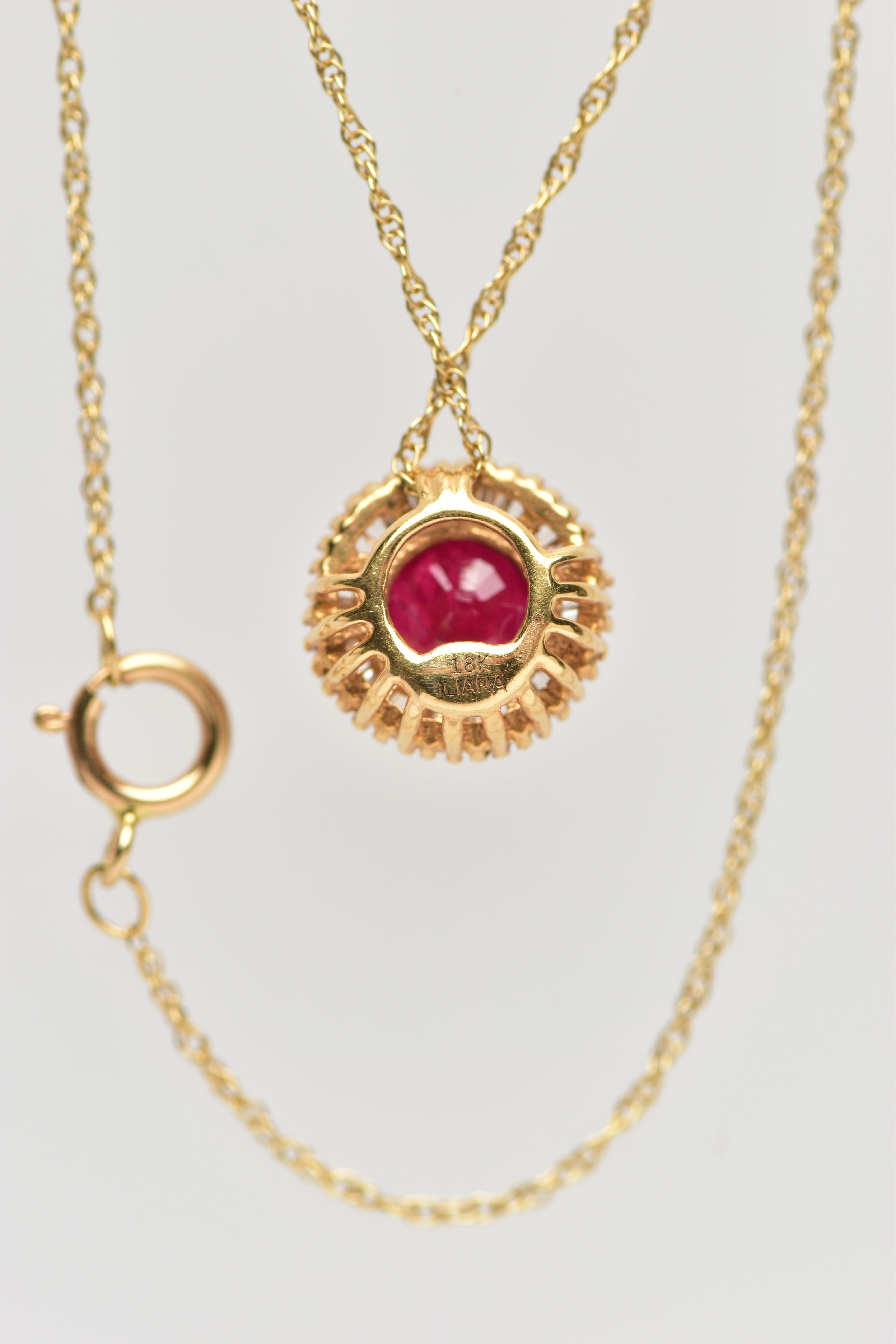 AN 18CT YELLOW GOLD GLASS FILLED RUBY AND DIAMOND CLUSTER PENDANT, WITH YELLOW METAL CHAIN, the - Image 4 of 4
