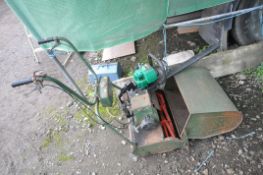 A VINTAGE ATCO PETROL CYLINDER MOWER with grass box ( engine pulls but with resistance and hasn't